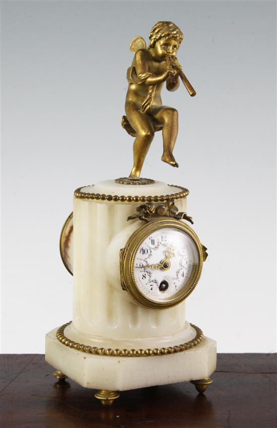 An early 20th century French ormolu mounted alabaster timepiece, 9.5in.